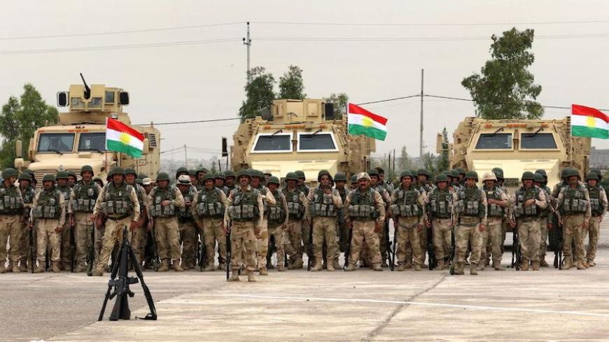 Kurdish Peshmerga fighters show their skills during a graduation ceremony on May 5, 2016 at the Kurdistan Training Coordination Center (KTTC) of Arbil, the capital of the autonomous Kurdish region of northern Iraq.
The KTTC is a joint effort of the Dutch, Italian, British and German governments which aims to unify the military assistance of these countries. / AFP / SAFIN HAMED (Photo credit should read SAFIN HAMED/AFP/Getty Images)