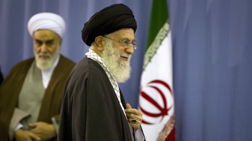 EDITORS' NOTE: Reuters and other foreign media are subject to Iranian restrictions on leaving the office to report, film or take pictures in Tehran.
Iran's Supreme Leader Ayatollah Ali Khamenei departs after casting his ballot in the parliamentary election in Tehran March 2, 2012. Polls opened on Friday for a parliamentary election in Iran that will test the popularity of the clerical establishment at a time of a standoff with the West over the country's nuclear programme.  REUTERS/Caren Firouz (IRAN - Tag