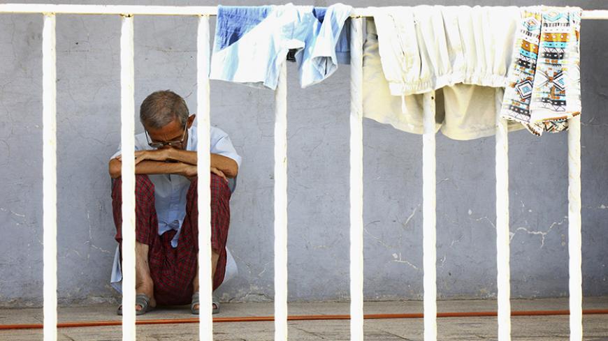 An Iraqi Christian man fleeing the violence in the Iraqi city of Mosul, sits inside the Sacred Heart of Jesus Chaldean Church in Telkaif near Mosul, in the province of Nineveh, July 20, 2014. The head of Iraq's largest church said on Sunday that Islamic State militants who drove Christians out of Mosul were worse than Mongol leader Genghis Khan and his grandson Hulagu who ransacked medieval Baghdad. Chaldean Catholic Patriarch Louis Raphael Sako led a wave of condemnation for the Sunni Islamists who demande
