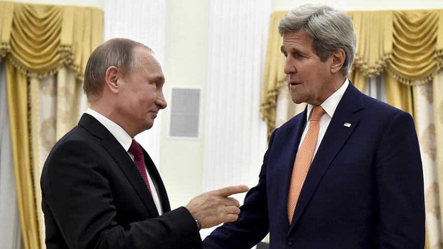 Russian President Vladimir Putin (L) speaks with U.S. Secretary of State John Kerry during a meeting at the Kremlin in Moscow, Russia, March 24, 2016. REUTERS/Alexander Nemenov/Pool - RTSC3SA
