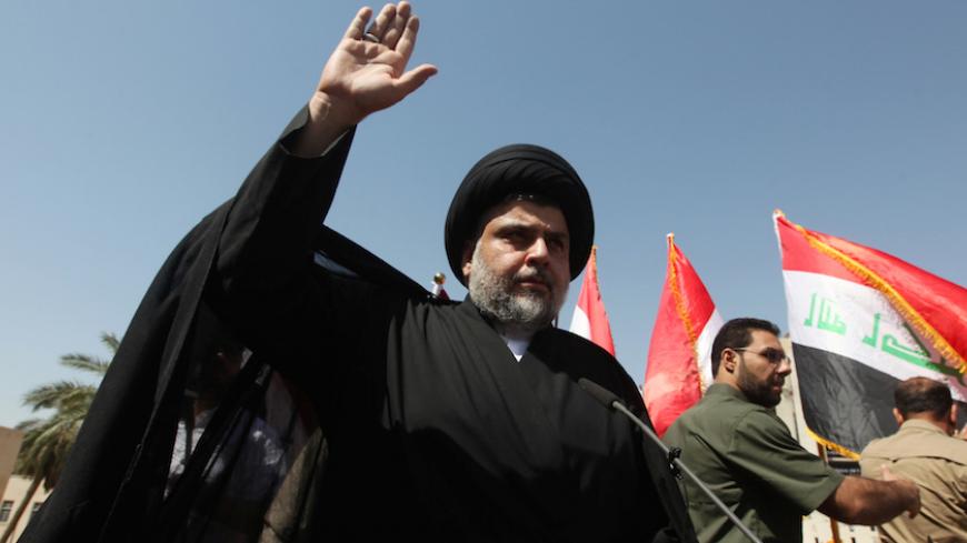 Iraqi Shi'ite cleric Moqtada al-Sadr is seen during a protest against corruption at Tahrir Square in Baghdad, July 15, 2016. REUTERS/Alaa Al-Marjani - RTSI1H7