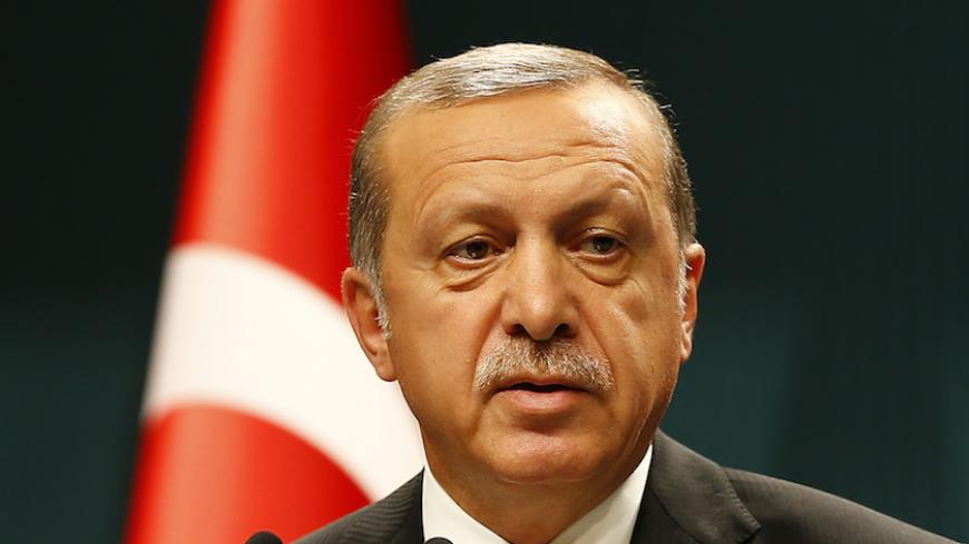 Turkish President Tayyip Erdogan speaks during a news conference following the National Security Council and cabinet meetings at the Presidential Palace in Ankara, Turkey, July 20, 2016. REUTERS/Umit Bektas - RTSIXHJ