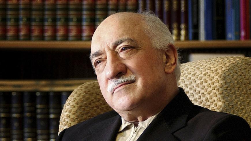 Islamic preacher Fethullah Gulen is pictured at his residence in Saylorsburg, Pennsylvania in this December 28, 2004 file photo. A rare defence from a secretive Islamic movement of its role in Turkish political life has exposed a rift with Prime Minister Tayyip Erdogan that could weaken one of modern Turkey's most powerful leaders. The spell of Gulen, a 72-year-old U.S.-based Islamic preacher with a global network of schools, whose supporters say they number in the millions, has long loomed large over Turke