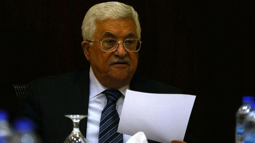 Palestinian President Mahmoud Abbas chairs a Palestinian Liberation Organization (PLO) executive committee meeting in the West Bank city of Ramallah, May 4, 2016. REUTERS/Mohamad Torokman   - RTX2CU11