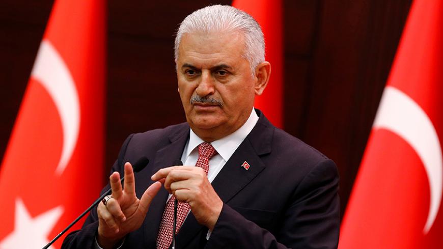 Turkey's Prime Minister Binali Yildirim addresses the media in Ankara, Turkey, June 27, 2016. REUTERS/Umit Bektas - RTX2IFQI