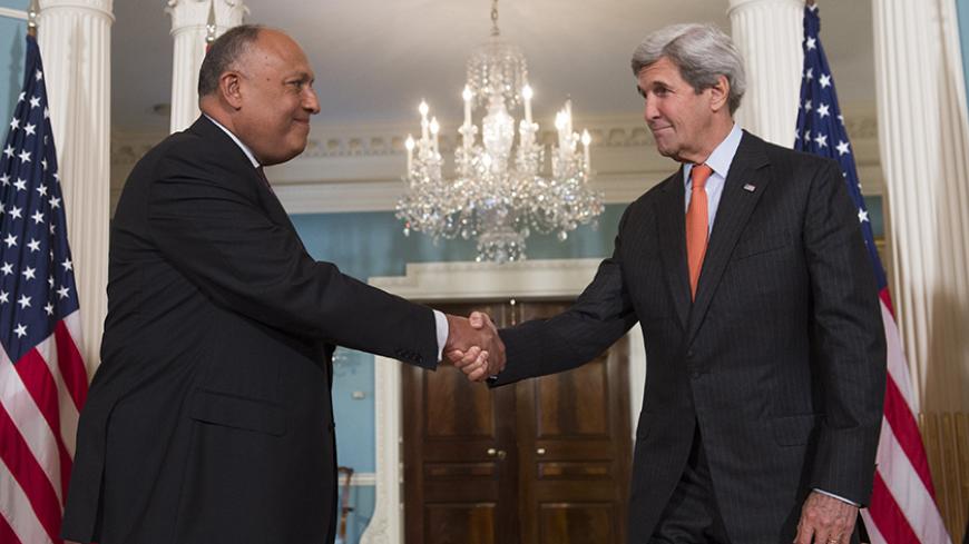 US Secretary of State John Kerry shakes hands with Egyptian Foreign Minister Sameh Hassan Shoukry (L) at the State Department in Washington, DC, July 21, 2016. / AFP / SAUL LOEB        (Photo credit should read SAUL LOEB/AFP/Getty Images)