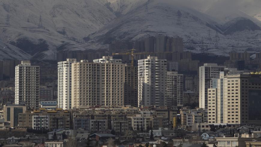 EDITORS' NOTE: Reuters and other foreign media are subject to Iranian restrictions on their ability to report, film or take pictures in Tehran. 

A general view of housing complexes in northwestern Tehran on a clear day February 12, 2011. REUTERS/Morteza Nikoubazl (IRAN - Tags: CITYSCAPE ENVIRONMENT) - RTR2IHNH