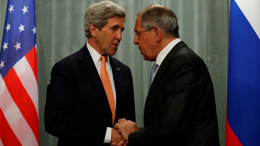 U.S. Secretary of State John Kerry (L) and Russian Foreign Minister Sergei Lavrov shake hands during a joint news conference following their meeting in Moscow, Russia, July 16, 2016.  REUTERS/Sergei Karpukhin - RTSI7AB