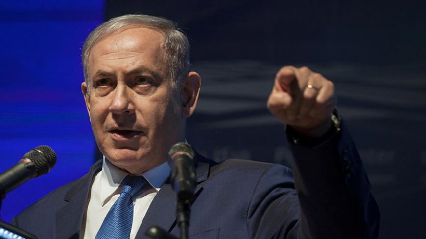 Israeli Prime Minister Benjamin Netanyahu gestures as he speaks during a ceremony at the Peres Center for Peace in Jaffa, Israel, July 21, 2016. REUTERS/POOL/Dan Balilty - RTSJ1NL