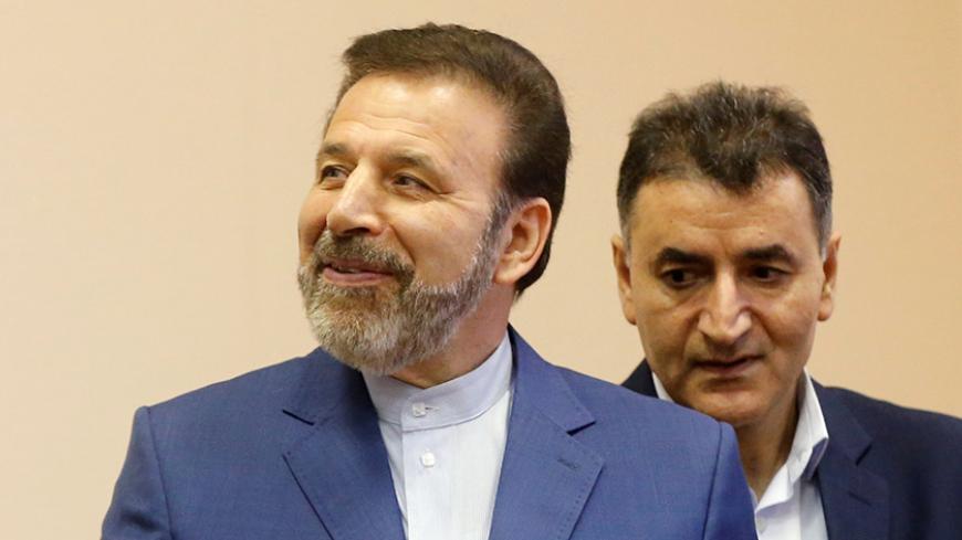 Russian Energy Minister Alexander Novak shakes hands with Iranian Communications Minister Mahmoud Vaezi during a signing ceremony after their meeting in Moscow, Russia, July 29, 2016. REUTERS/Maxim Zmeyev - RTSK8HC