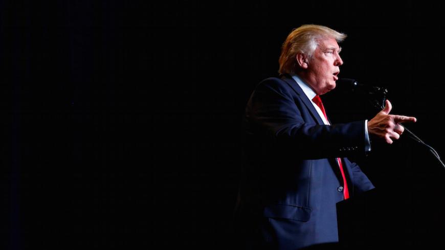 Republican U.S. Presidential nominee Donald Trump attends campaign event at the KI Convention Center in Green Bay, Wisconsin August 5, 2016. REUTERS/Eric Thayer - RTSLAL9