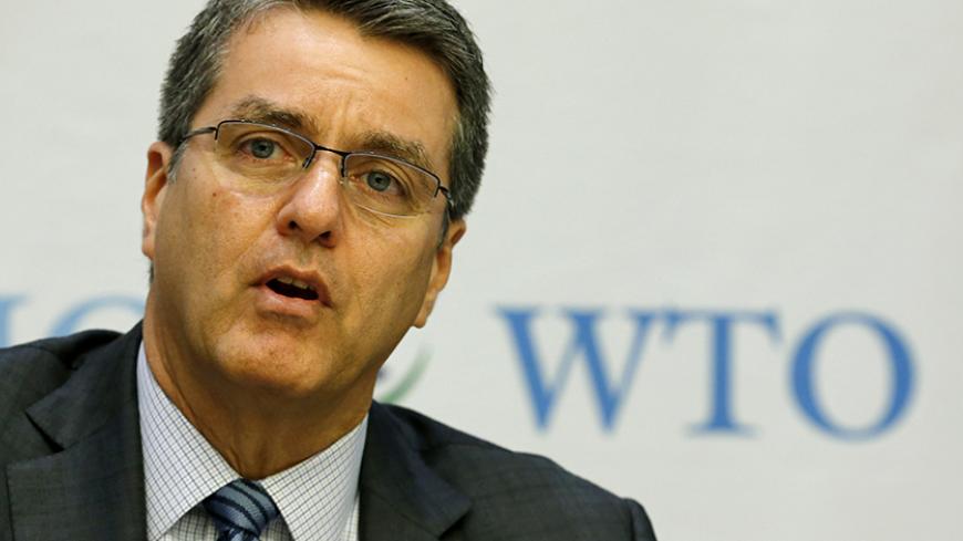 World Trade Organization (WTO) Director-General Roberto Azevedo attends a news conference on the launch of the World Trade Report 2015 in Geneva, Switzerland, October 26, 2015. The benefits of a treaty that will cut red tape at borders and standardise customs procedures are much larger than previously thought and could add $3.6 trillion to annual global exports, the World Trade Organization (WTO) said in a report on Monday. REUTERS/Denis Balibouse - RTX1T975