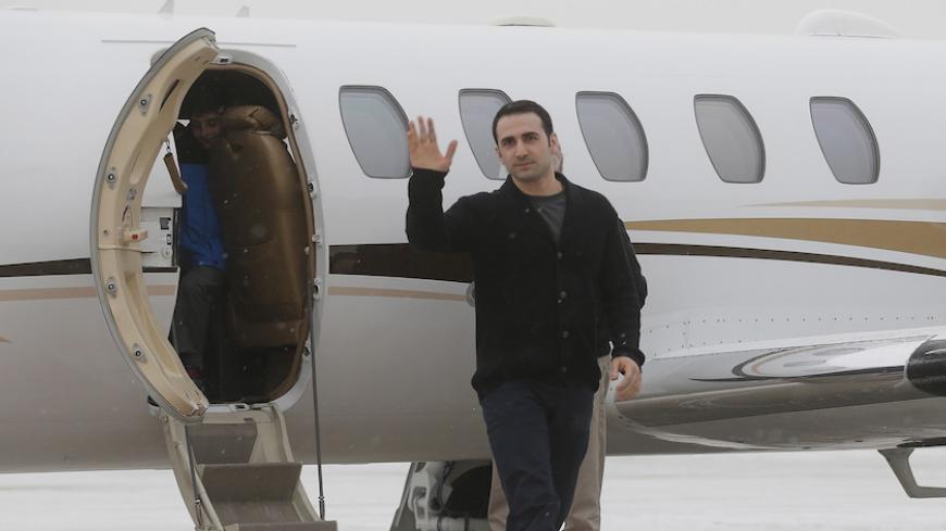 Former U.S. Marine Amir Hekmati, recently released from an Iranian prison, arrives at an airport in Flint, Michigan January 21, 2016. REUTERS/Rebecca Cook TPX IMAGES OF THE DAY - RTX23GED
