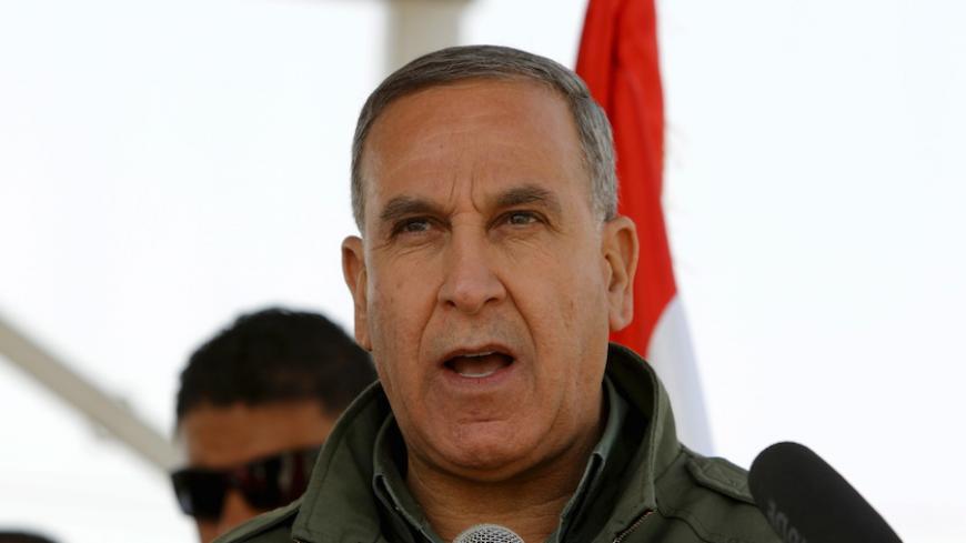 Iraqi Defence Minister Khaled al-Obeidi speaks to the media at an Iraqi army base in Camp Taji in Baghdad, February 21, 2016. REUTERS/Ahmed Saad - RTX27Y23