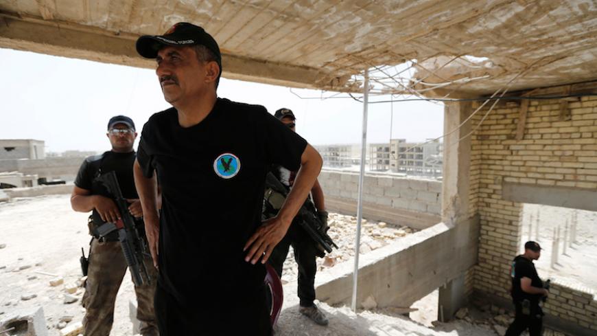Lieutenant General Abdelwahab al-Saadi speaks during an interview with Reuters in Falluja, Iraq, June 20, 2016. REUTERS/Thaier Al-Sudani - RTX2H7ML