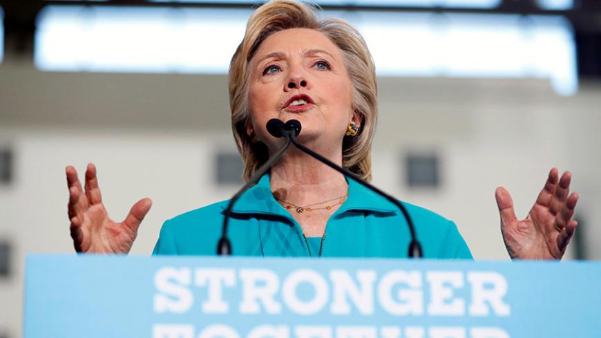 Democratic presidential nominee Hillary Clinton speaks at a rally at Truckee Meadows Community College in Reno, Nevada, August 25, 2016. REUTERS/Aaron P. Bernstein/File Photo - RTX2N5T7