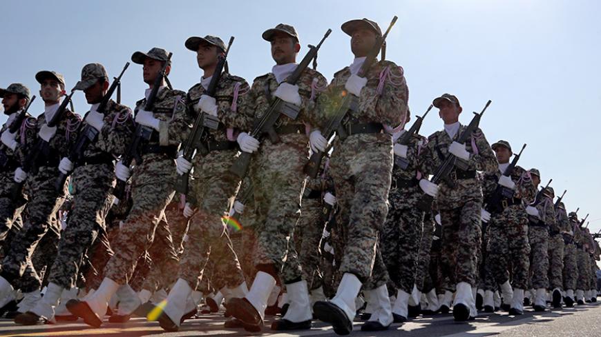 Iranian soldiers march during the annual military parade marking the anniversary of the start of Iran's 1980-1988 war with Iraq, on September 22, 2015, in the capital Tehran.  AFP PHOTO / ATTA KENARE        (Photo credit should read ATTA KENARE/AFP/Getty Images)
