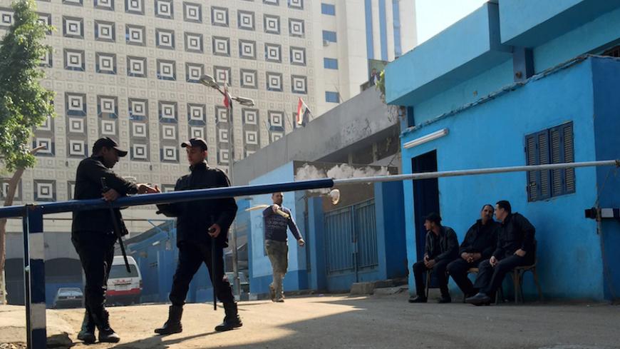 Policemen guard in front of a morgue where the body of Italian Giulio Regeni is kept in Cairo, Egypt, February 4, 2016. To match Special Report EGYPT-REGENI/ REUTERS/Staff/File Photo - RTSKZ1T