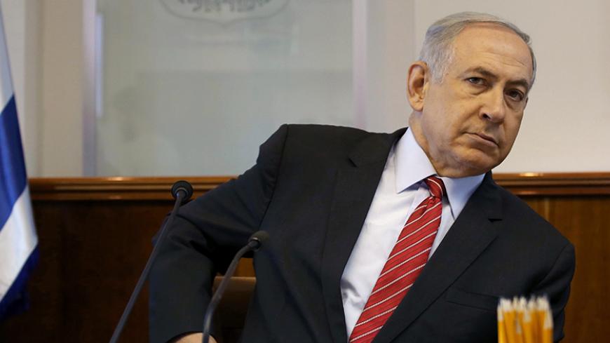 Israeli Prime Minister Benjamin Netanyahu looks on as he chairs the weekly cabinet meeting at his Jerusalem office on September 11, 2016. REUTERS/Gali Tibbon/Pool - RTSN7M0