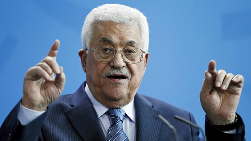 Palestinian President Mahmoud Abbas speaks during a news conference with Chancellor Angela Merkel (unseen) at the Chancellery in Berlin, Germany, April 19, 2016. REUTERS/Hannibal Hanschke  - RTX2AOLJ