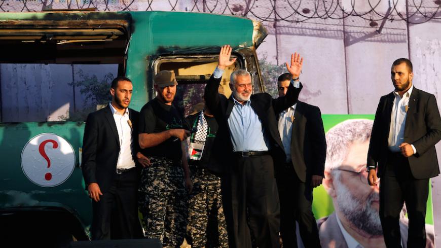 Palestinian Hamas leader in Gaza Ismail Haniyeh waves to his supporters during an anti-Israeli rally in Gaza city April 28, 2016.  REUTERS/Suhaib Salem       - RTX2C2YQ