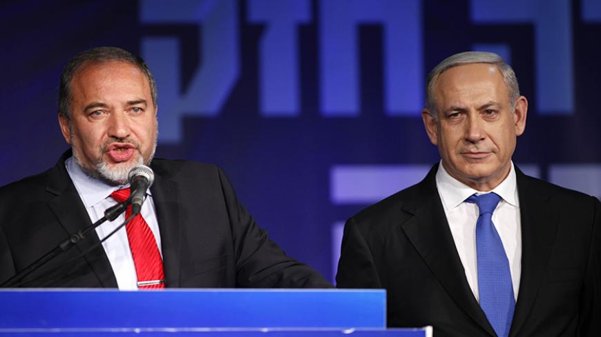 TEL AVIV, ISRAEL - JANUARY 23: (ISRAEL OUT) Israeli Prime Minister Benjamin Netanyahu and Former Israel Minister for Foreign Affairs Avigdor Liberman at his election campaign headquarters on Janurary 23, 2013 in Tel Aviv, Israel. Netanyahu was re-elected for a third term and will return to office, according to exit polls. Israel had the highest turnout of voters since 1999. (Photo by Lior Mizrahi /Getty Images)