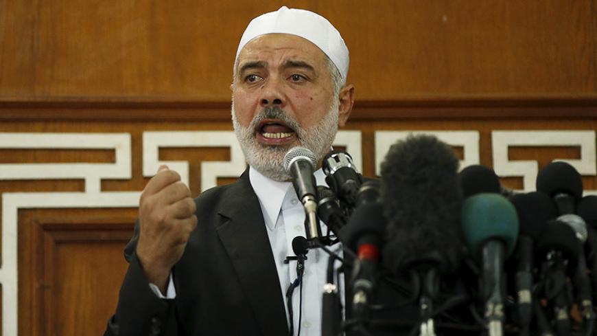 Hamas leader in Gaza Ismail Haniyeh delivers a sermon during Friday prayers in Gaza City October 9, 2015. Haniyeh called on Palestinians to step up their fight against Israel, describing the recent surge in violence in Jerusalem and the occupied West Bank as the beginning of a new uprising, or intifada. REUTERS/Mohammed Salem  - RTS3QIL