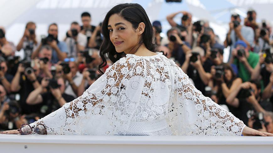 Cast member Golshifteh Farahani poses during a photocall for the film "Paterson" in competition at the 69th Cannes Film Festival in Cannes, France, May 16, 2016. REUTERS/Regis Duvignau TPX IMAGES OF THE DAY - RTSEJ46