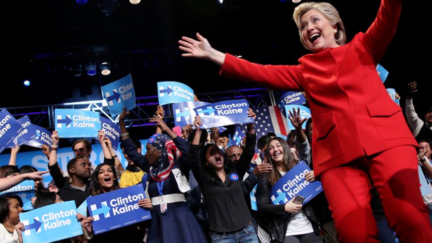 U.S. Democratic presidential candidate Hillary Clinton reacts as she arrive to meet with campaign supporters after the first presidential debate with Republican presidential nominee Donald Trump, in Westbury, New York, U.S., September 26, 2016. REUTERS/Carlos Barria - RTSPKZ8