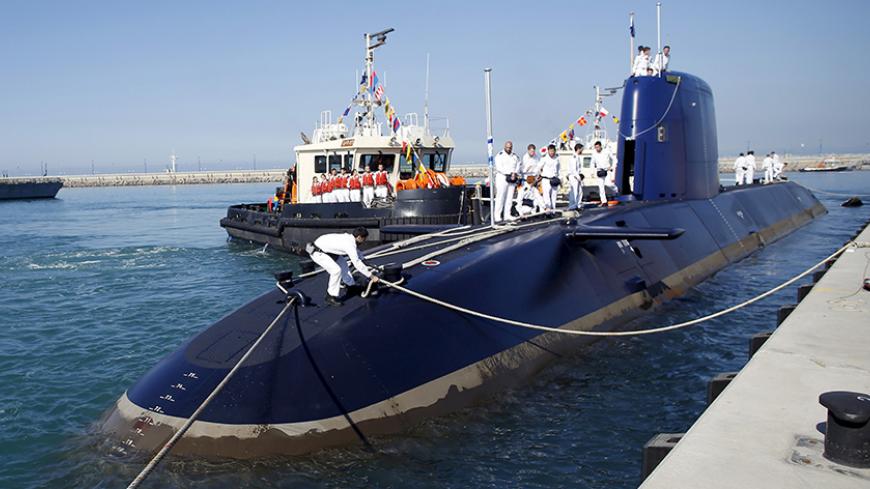 Israel Navy soldiers stand on the Rahav, the fifth submarine in the fleet, as it docks in Haifa port January 12, 2016. The Dolphin-class submarines, widely believed to be capable of firing nuclear missiles, were manufactured in Germany and sold to Israel at deep discounts as part of Berlin's commitment to shoring up the security of the country set in part as a haven for Jews who survived the Holocaust. REUTERS/Baz Ratner - RTX221FX