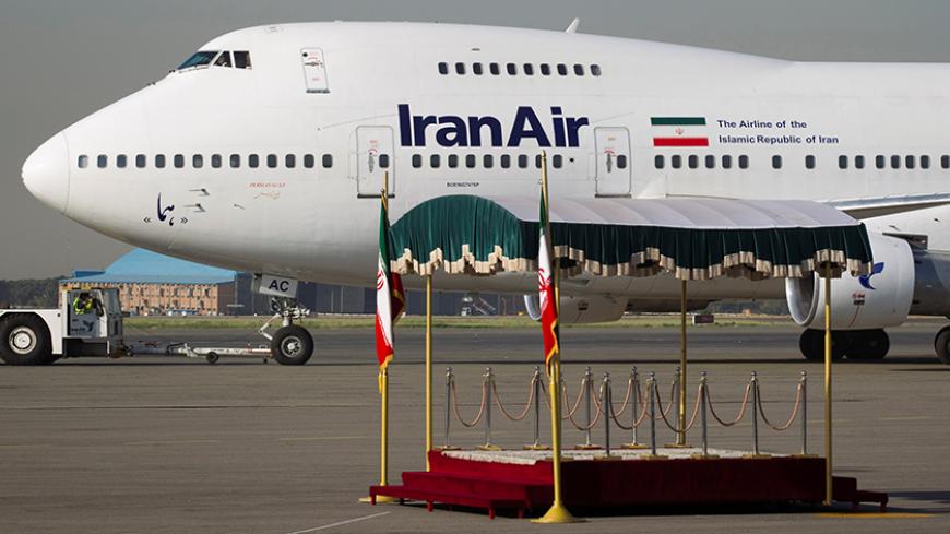 EDITORS' NOTE: Reuters and other foreign media are subject to Iranian restrictions on their ability to film or take pictures in Tehran.FILE PHOTO: A IranAir Boeing 747SP aircraft is pictured before leaving Tehran's Mehrabad airport September 19, 2011. REUTERS/Morteza Nikoubazl/File photo - RTX2GZM9