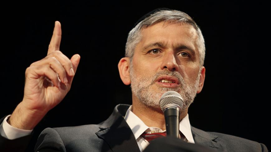 Israeli Interior Minister, Eli Yishai one of the three leaders of the Shas ultra-orthodox Sephardi party gestures during the First High-Tech Conference for Israel's Haredi Sector on January 15, 2013 in Jerusalem. AFP PHOTO/GALI TIBBON (Photo credit should read GALI TIBBON/AFP/Getty Images)