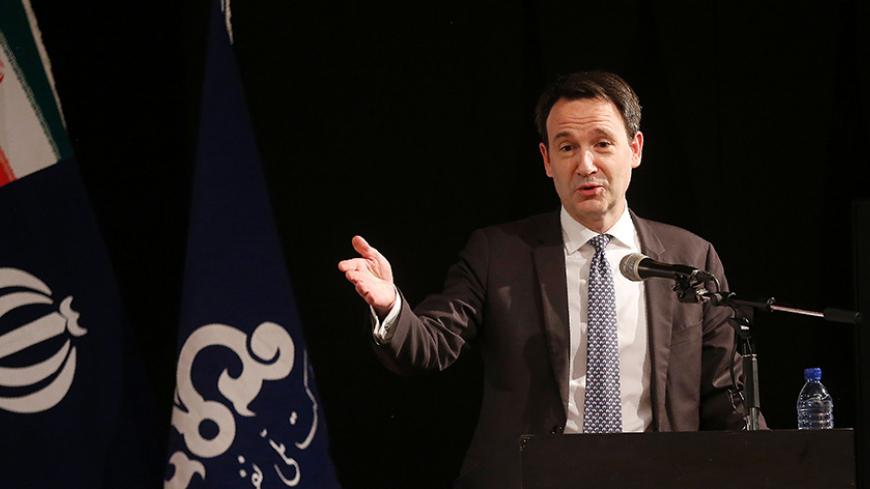 Stephane Michel, Total's head of Middle East exploration and production, speaks during a conference with Iran's Oil Minister after signing an offshore gas field agreement in Tehran, on November 8, 2016.
Iran signed a deal with France's Total to develop a major offshore gas field, its first big contract with a Western energy firm since sanctions were loosened in January.

 / AFP / ATTA KENARE        (Photo credit should read ATTA KENARE/AFP/Getty Images)
