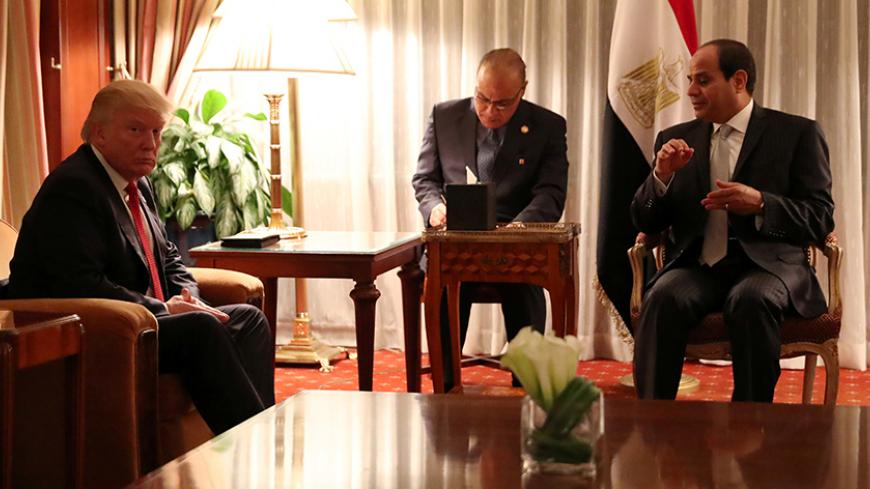Republican Presidential nominee Donald Trump holds a bi-lateral meeting with Egyptian President Abdel Fattah el-Sisi in Manhattan, New York, U.S., September 19, 2016. REUTERS/Carlo Allegri - RTSOIF0