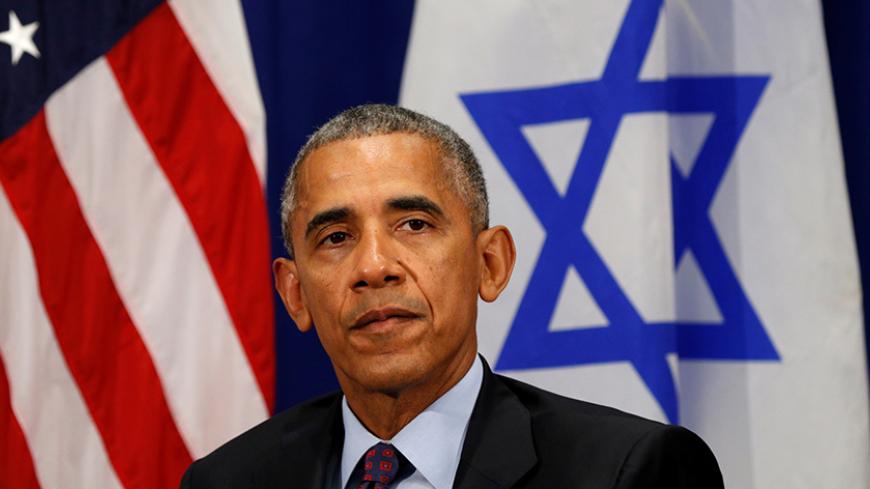 U.S. President Barack Obama looks up during his meeting with Israeli Prime Minister Benjamin Netanyahu in New York September 21, 2016. REUTERS/Kevin Lamarque - RTSOTI2
