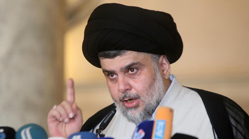 Iraqi Shi'ite cleric Moqtada al-Sadr delivers a sermon to worshippers during Friday prayers at the Kufa mosque near Najaf, Iraq September 23, 2016. REUTERS/Alaa Al-Marjani - RTSP3OH