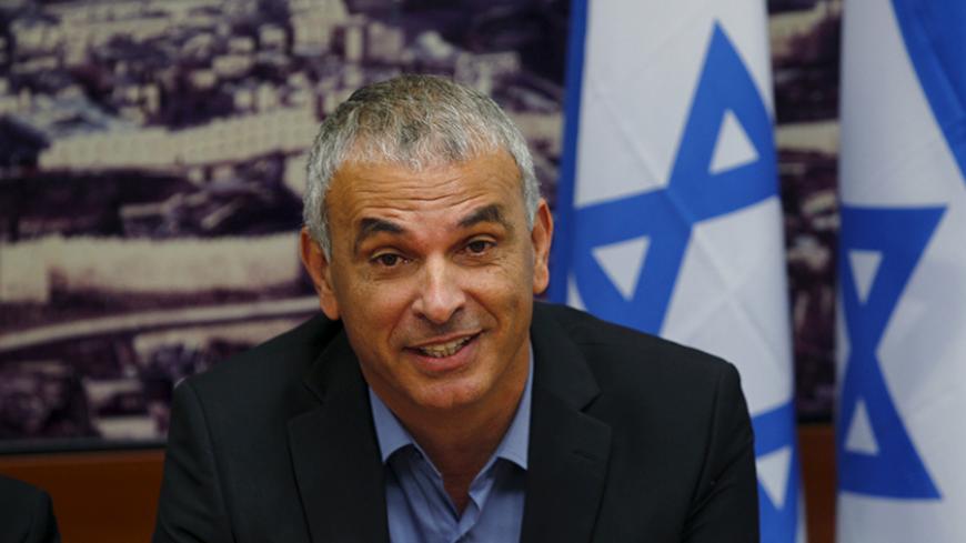 Moshe Kahlon, Israel's new Finance Minister, attends a meeting at the Finance Ministry in Jerusalem May 18, 2015. Boosting competition in Israel's banking system and the economy as a whole as well as bringing down property prices will be priorities for the country's new finance minister, he said on Monday. REUTERS/Ronen Zvulun - RTX1DH88