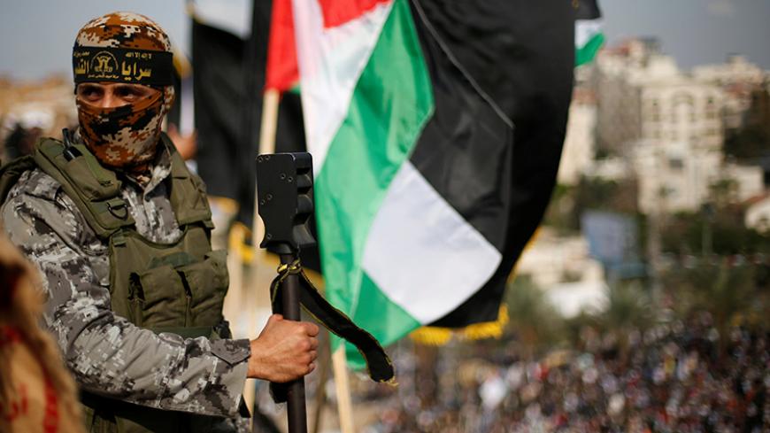 Palestinians attend a rally marking the 29th anniversary of the foundation of the Islamic Jihad movement in Gaza City October 21, 2016.   REUTERS/Suhaib Salem - RTX2PVA3