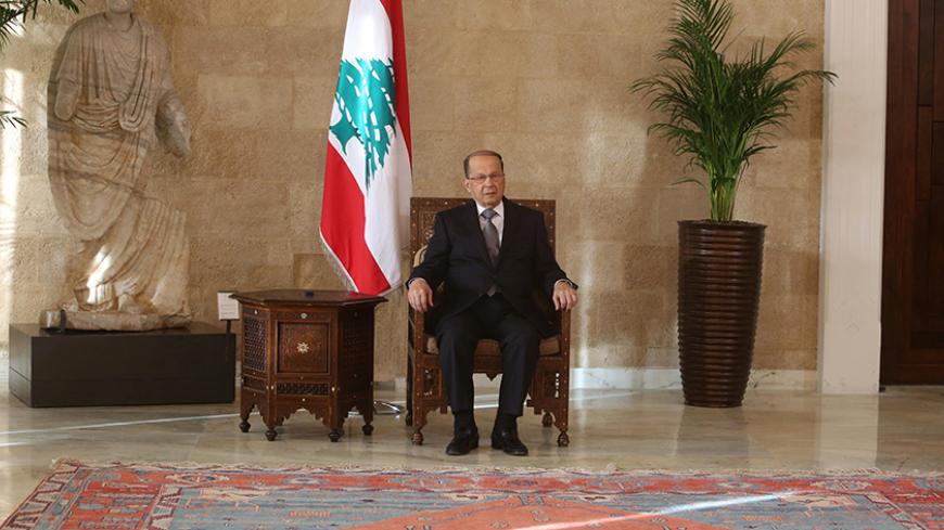 Newly elected Lebanese president Michel Aoun sits on the president's chair inside the presidential palace in Baabda, near Beirut, Lebanon October 31, 2016. REUTERS/Aziz Taher - RTX2R7JE