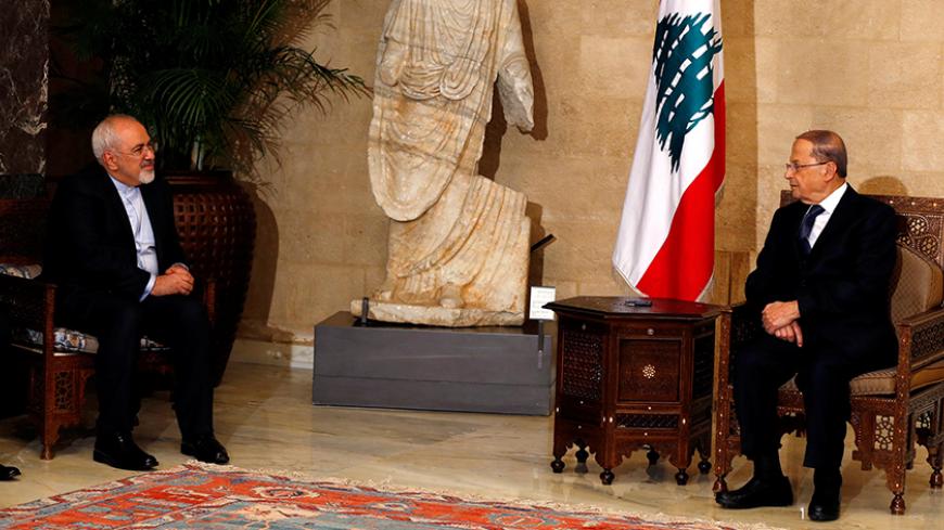 Iran's Foreign Minister Mohammad Javad Zarif (L) meets with Lebanese President Michel Aoun, upon his arrival to the presidential palace in Baabda, near Beirut, Lebanon November 7, 2016. REUTERS/Mohamed Azakir - RTX2SD04