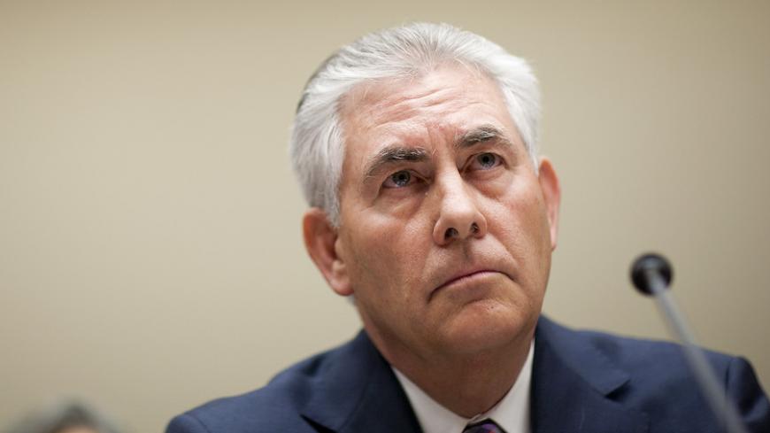 Rex Tillerson, chairman and CEO of ExxonMobil, testifies about the company's acquisition of XTO Energy before the House Energy and Environment Subcommittee on Capitol Hill in Washington January 20, 2010. U.S. Democratic lawmakers on Wednesday expressed concern that the merger of Exxon Mobil and XTO Energy would reduce competition in the oil and gas markets and increase the use of a controversial drilling technique.    REUTERS/Joshua Roberts    (UNITED STATES - Tags: POLITICS BUSINESS ENERGY) - RTR296RQ