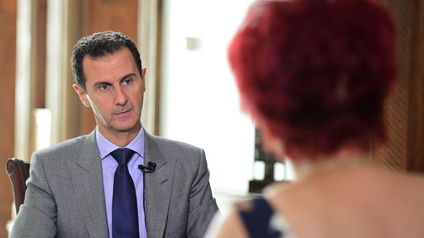 Syria's President Bashar al-Assad speaks during an interview with Russian tabloid Komsomolskaya Pravda, in this handout picture provided by SANA on October 14, 2016. SANA/Handout via REUTERS ATTENTION EDITORS - THIS PICTURE WAS PROVIDED BY A THIRD PARTY. REUTERS IS UNABLE TO INDEPENDENTLY VERIFY THE AUTHENTICITY, CONTENT, LOCATION OR DATE OF THIS IMAGE. FOR EDITORIAL USE ONLY. TPX IMAGES OF THE DAY - RTSS7BS
