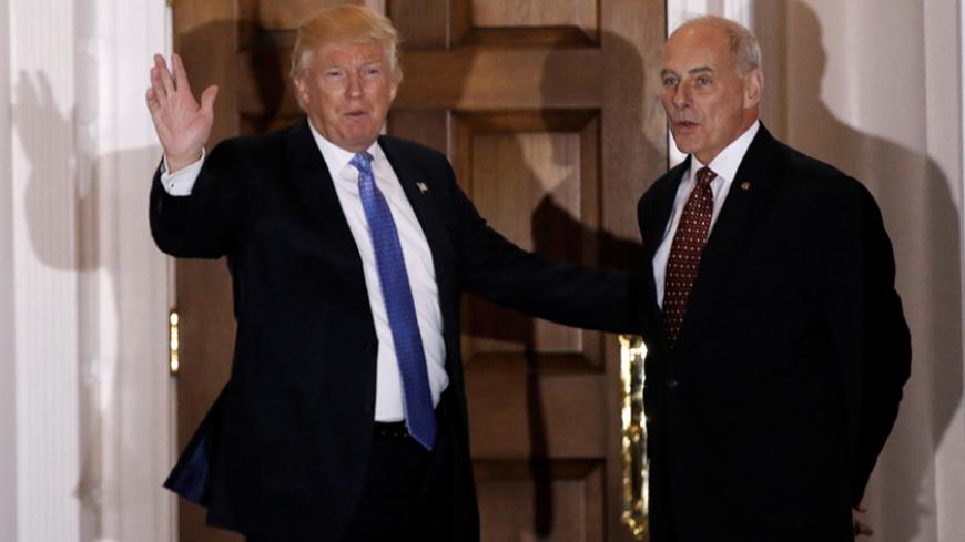 U.S. President-elect Donald Trump appears with retired Marine Corps General John Kelly outside the main clubhouse after their meeting at Trump National Golf Club in Bedminster, New Jersey, U.S., November 20, 2016. REUTERS/Mike Segar - RTSSJJL