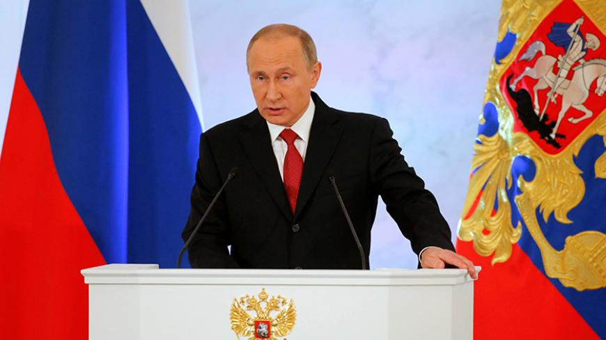 Russian President Vladimir Putin delivers a speech during his annual state of the nation address at the Kremlin in Moscow, Russia, December 1, 2016. REUTERS/Maxim Shemetov - RTSU5AA