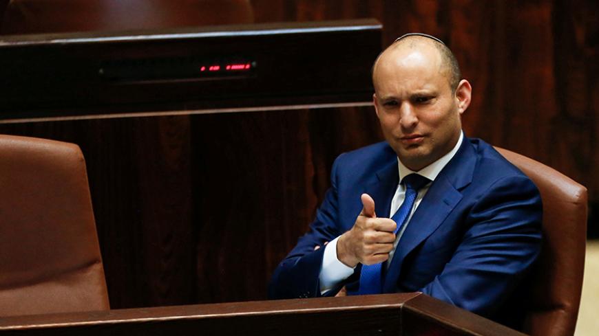 Israeli Education Minister Naftali Bennett gestures during a preliminary vote on a bill at the Knesset, the Israeli parliament, in Jerusalem November 16, 2016. REUTERS/Ammar Awad/File Photo - RTSV2KJ