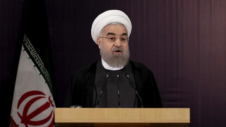 Iranian President Hassan Rouhani talks to journalists after he registered for February's election of the Assembly of Experts, the clerical body that chooses the supreme leader, at Interior Ministry in Tehran December 21, 2015. REUTERS/Raheb Homavandi/TIMA ATTENTION EDITORS - THIS IMAGE WAS PROVIDED BY A THIRD PARTY. FOR EDITORIAL USE ONLY. - RTX1ZKIQ
