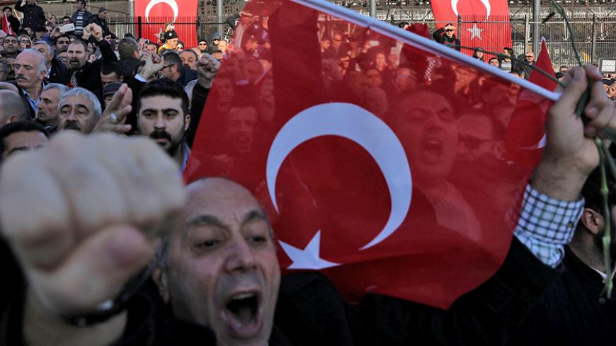 People shout slogans as they protest against Saturday's blasts in Istanbul, Turkey December 11, 2016. REUTERS/Huseyin Aldemir - RTX2UIRL