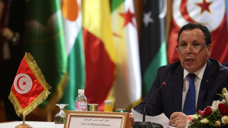 Tunisian Foreign Minister Khemaies Jhinaoui speaks during the 8th ministerial meeting of Libya's neighbouring countries in Tunis, Tunisia March 22, 2016. REUTERS/Zoubeir Souissi - RTSBQCR