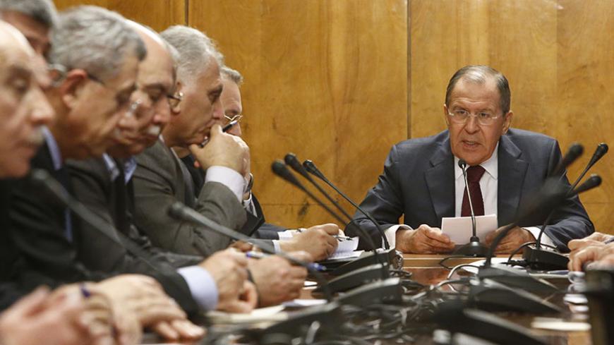 Russian Foreign Minister Sergei Lavrov (R) meets with representatives of Palestinian political parties and movements in Moscow, Russia, January 16, 2017. REUTERS/Sergei Karpukhin - RTSVQN6