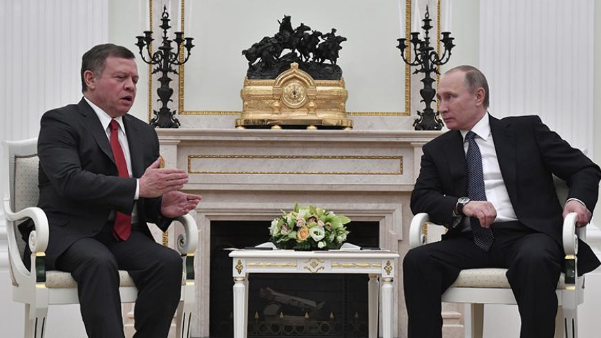 Russian President Vladimir Putin meets with Jordan's King Abdullah at the Kremlin in Moscow, Russia January 25, 2017. REUTERS/Alexander Nemenov/Pool - RTSXBNR